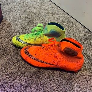 Brand new orange and green neon cleats. Awesome!